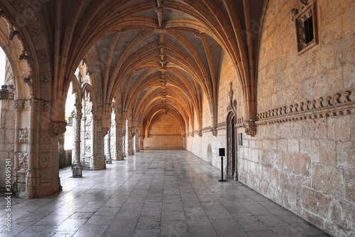 Archway of an old monastery. Cloisters of Jeronimos Monastery. Lisbon Portugal