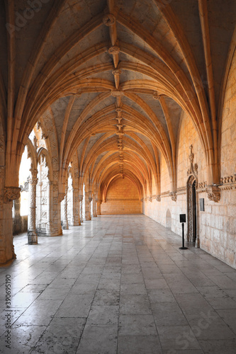 Archway of an old monastery. Cloisters of Jeronimos Monastery. Lisbon Portugal
