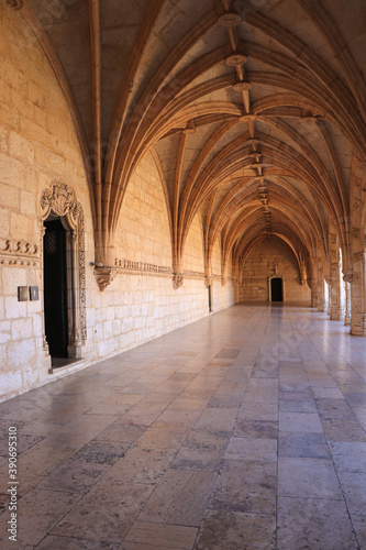 Archway of an old monastery. Cloisters of Jeronimos Monastery. Lisbon Portugal