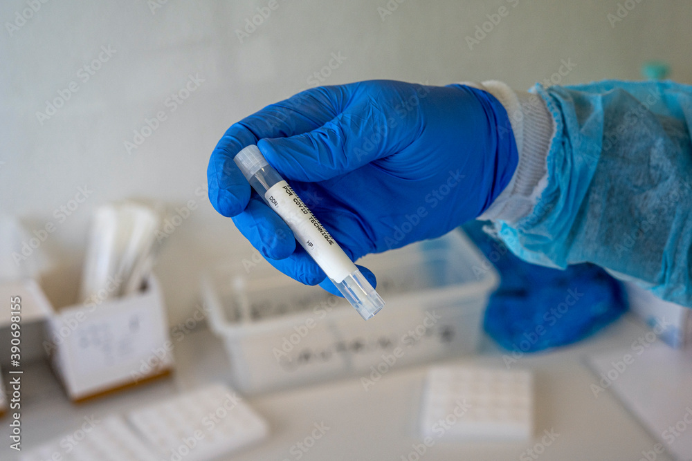 Coronavirus COVID-19 specimen collecting equipment nasal and oral swabbing for PCR polymerase chain reaction laboratory testing procedure. Coronavirus COVID-19 specimen collecting equipment nasal and oral swabbing for PCR polymerase chain reaction laboratory testing procedure.