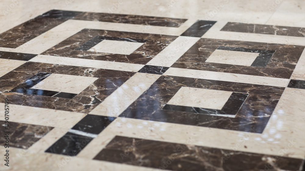 Fototapeta premium marble tiled floor with abstract geometric pattern