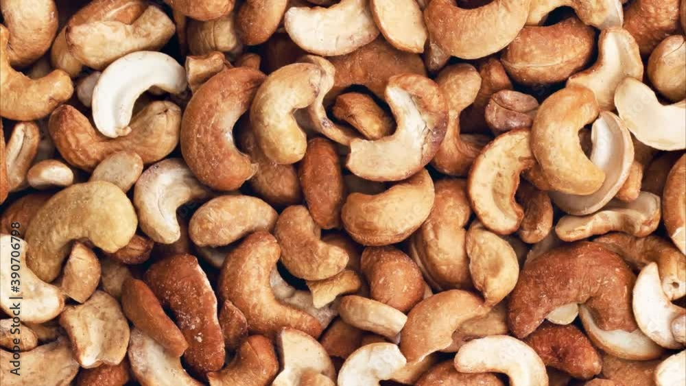 Rotating cashew nuts peeled full. View from above. Rotating cashew nuts peeled full. View from above.