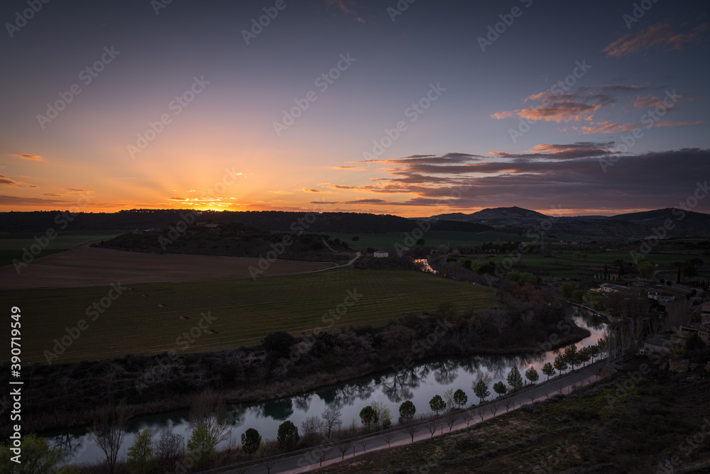 Beautiful spring sunset over the countryside and Tagus river, Zorita de los Canes, Guadalajara, Spain