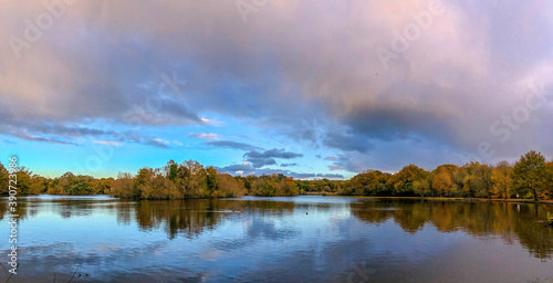 Epping Forest Connaught water Autumn landscape view with reflection photo