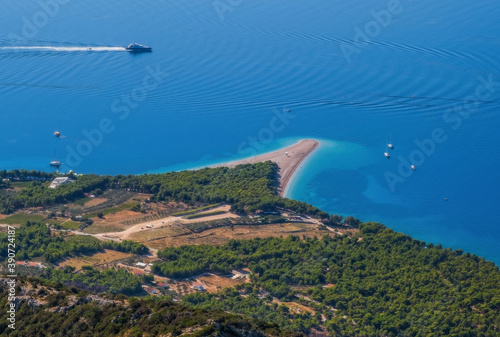 Panoramic top view on beach Zlatni Rat from mountain Vidova Gora. Croatia, Brac island, august 2020.