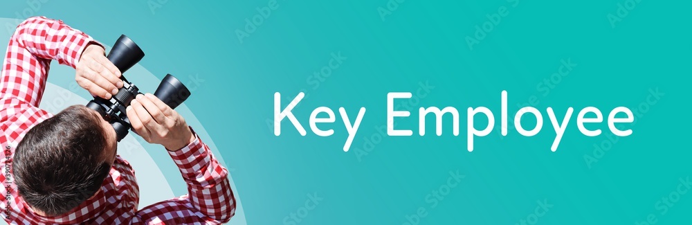 Naklejka premium Key Employee. Man observing with binoculars. Focus on text/word. Panorama format. Blue/turquoise background.