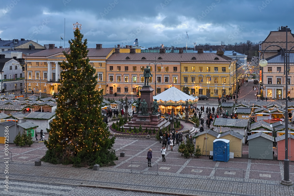Christmas market at the Senate Square of Helsinki, Finland. View from the Helsinki Cathedral. Christmas market at the Senate Square of Helsinki, Finland. View from the Helsinki Cathedral.