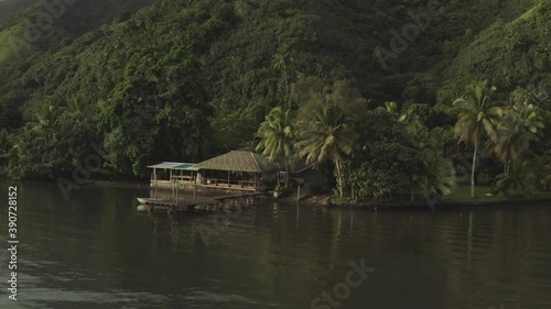 beautifull local house on the lagoon, tahiti, frenc polynesia, drone shot 4K photo