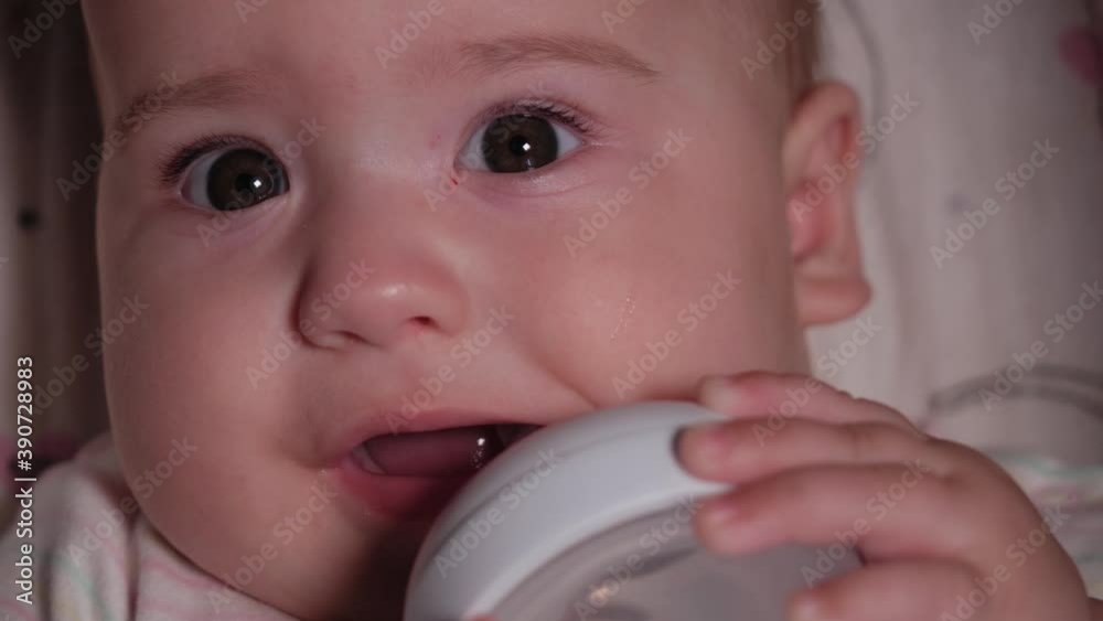 infant, childhood, emotion concept Extreme closeup of smiling face