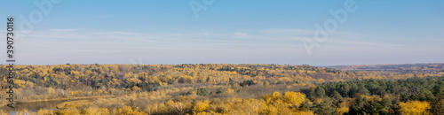 top view of the autumn yellow forest and the Gauja river.