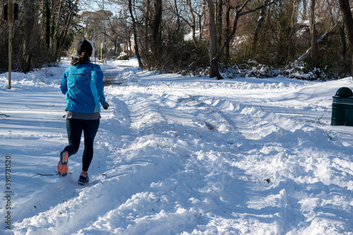 Runner in Snowy Park