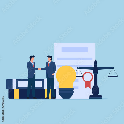 Man handshake in front of bulb, certificate and scales of justice metaphor of patent law.