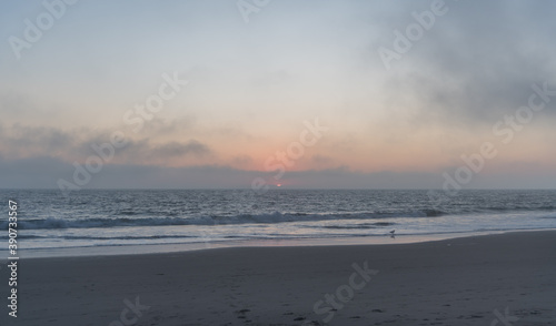 Beautiful foggy Zuma Beach sunset, Malibu, Southern California 