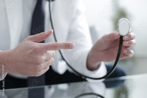 Doctor holding a stethoscope in his hand