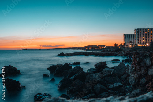 Fototapeta Naklejka Na Ścianę i Meble -  sunset over the sea in large exposition