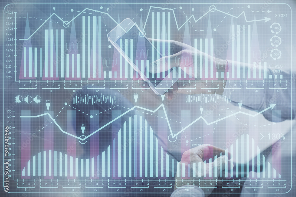 Double exposure of man's hands holding and using a digital device and forex graph drawing. Financial market concept. Double exposure of man's hands holding and using a digital device and forex graph drawing. Financial market concept.