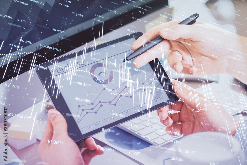 Double exposure of man's hands holding and using a phone and financial chart drawing. Market analysis concept. Double exposure of man's hands holding and using a phone and financial chart drawing. Market analysis concept.