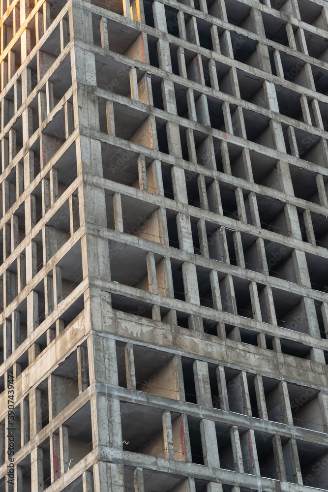 high multi-storey house under construction close-up vertical background high multi-storey house under construction close-up vertical background