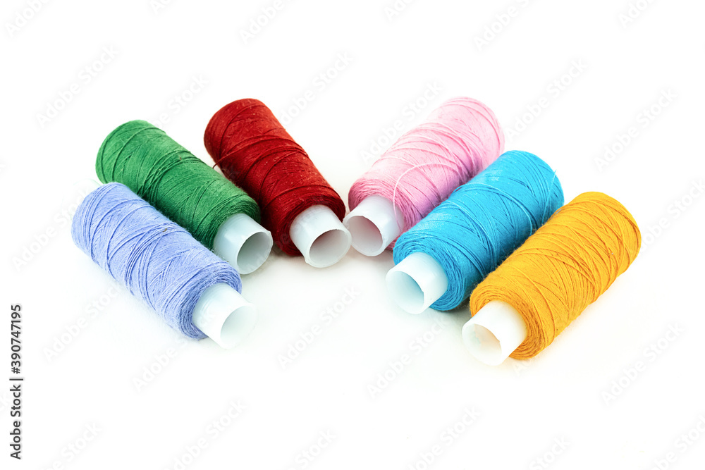 set of threads for needlework folded in a semicircle on a white isolated background set of threads for needlework folded in a semicircle on a white isolated background