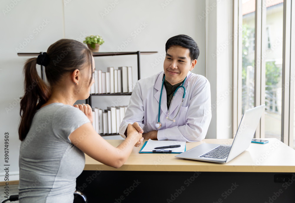 Happy smiling professional psychologist male successful about conducting a consultation stressful woman. health, people and treatment concept Happy smiling professional psychologist male successful about conducting a consultation stressful woman. health, people and treatment concept