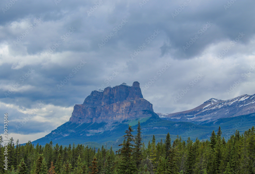 A landscape picture of the mountain and adjacent forest at the Banff National Park. A landscape picture of the mountain and adjacent forest at the Banff National Park.