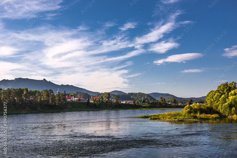 View of the village of Turochak on the Bank of the Biya. altai republic View of the village of Turochak on the Bank of the Biya. altai republic