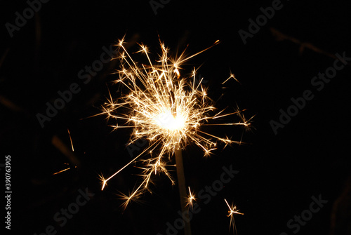 Abstract shot of a burning firework fuse photo