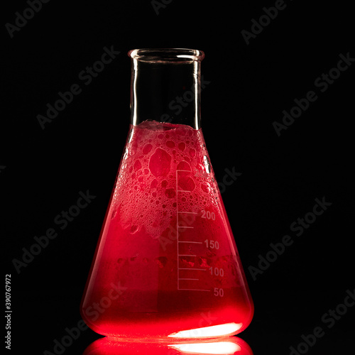 Glass flask with a chemical reagent. photo