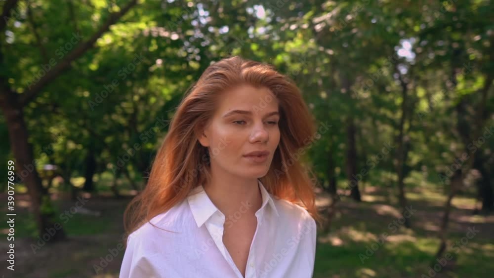 camera move around face young woman with beautiful red long hair lifestyle in summer season outdoors camera move around face young woman with beautiful red long hair lifestyle in summer season outdoors
