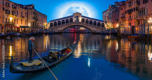 Fototapeta Naklejka Na Ścianę i Meble -  Gondola near Rialto Bridge with full moon - Venice, Italy 