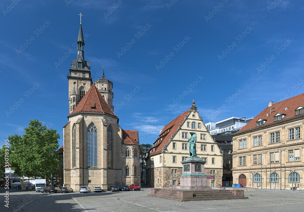 Fototapeta premium Stuttgart, Germany. Schillerplatz square with Friedrich Schiller memorial and Stiftskirche (Collegiate Church). The memorial was erected in 1839.