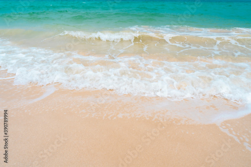 Beautiful quiet white sand beach and sea wave in Tropical ocean summer time.