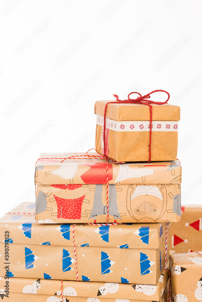 Obraz premium Many gifts in wrapped boxes on white background