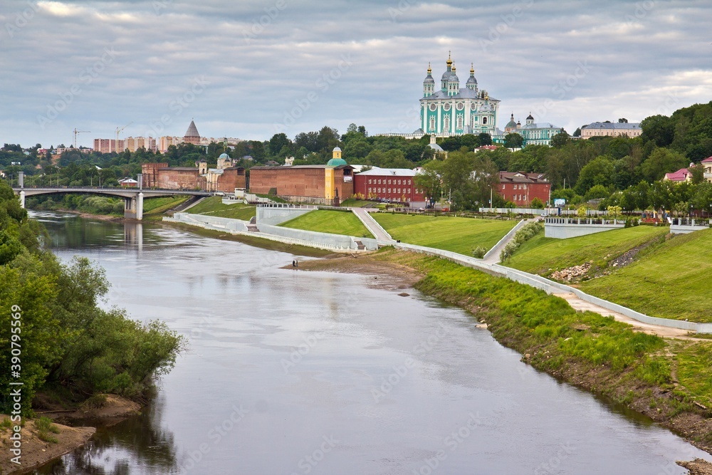 The view on Smolensk, the Cathedral of Assumption, the Dnieper river and the embankment in summer in Russia. The view on Smolensk, the Cathedral of Assumption, the Dnieper river and the embankment in summer in Russia.