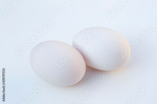 Fresh duck eggs on white background.