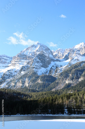 frozen alpine Lake Tovel of Dolomites, Italy