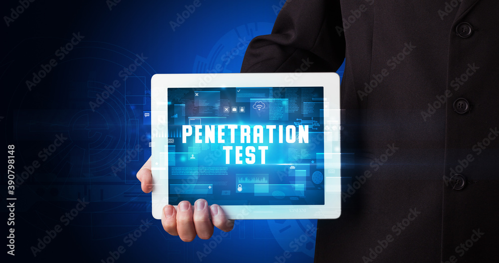 Young business person working on tablet and shows the digital sign: PENETRATION TEST Young business person working on tablet and shows the digital sign: PENETRATION TEST
