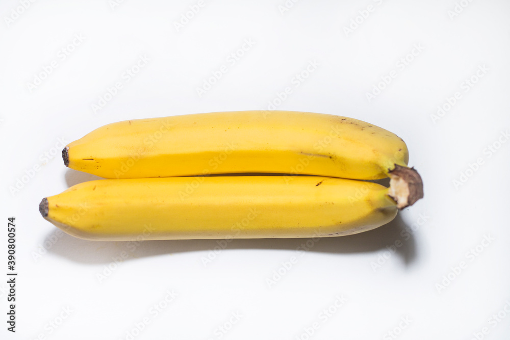 bananas on yellow background bananas on yellow background