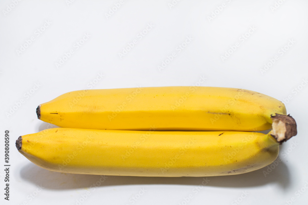 bananas on yellow background