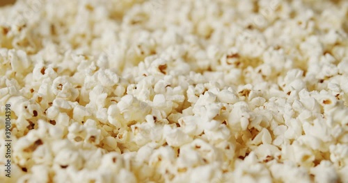 delicious popcorn on a rotating background