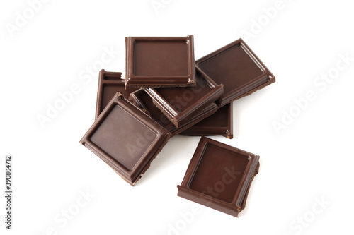 Pieces of chocolate isolated on white background