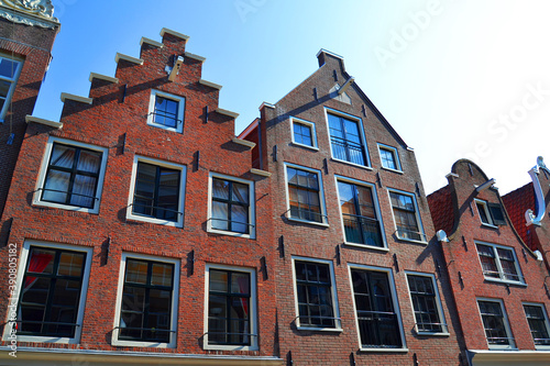 Traditional dutch architecture, facades of houses in Amsterdam, The Netherlands.