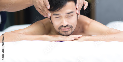 Young man relaxing during getting a massage