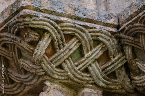 ornamental entrance, Hermitage of Nuestra Señora del Valle, Romanesque ogival temple of Byzantine influence, XII century, Burgos, Spain photo