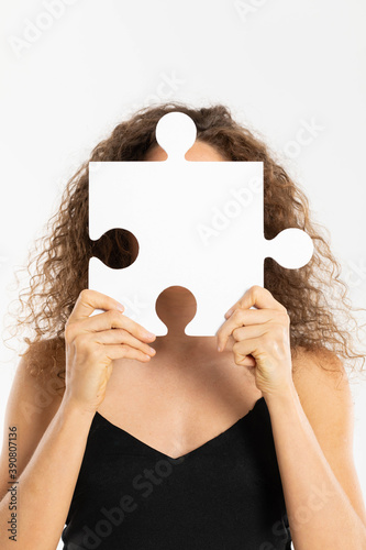 Maintained anonymity by covering your face with one large puzzle. Let's include race tolerance. photo