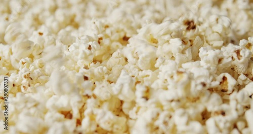 delicious popcorn on a rotating background