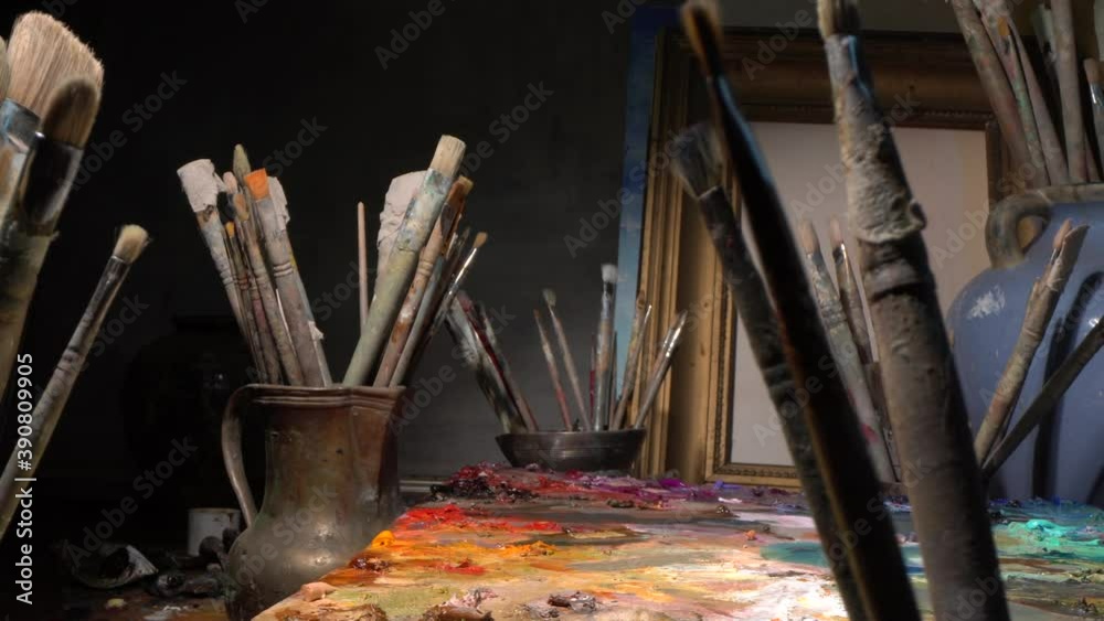 Art studio interior with tools for painting - Brushes, oil paints, palette, canvas, easel. Creative Arts Workshop for artist, designer, sculptor, and architect Art studio interior with tools for painting - Brushes, oil paints, palette, canvas, easel. Creative Arts Workshop for artist, designer, sculptor, and architect