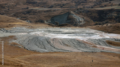 Active mud volcano in the highlands photo