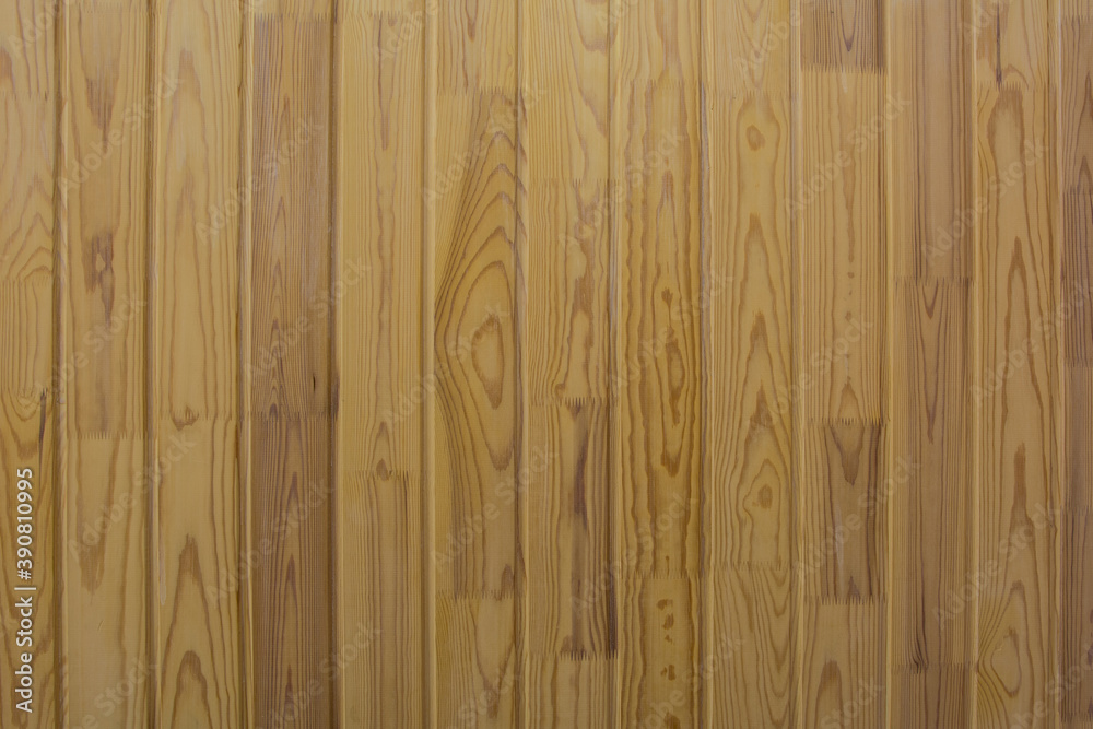 Fototapeta premium Background from light yellow wooden boards texture.