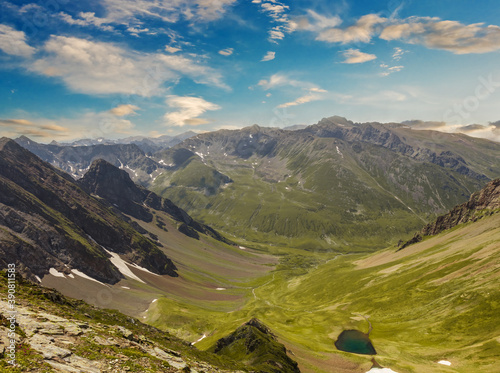 mountain chain over a green valley